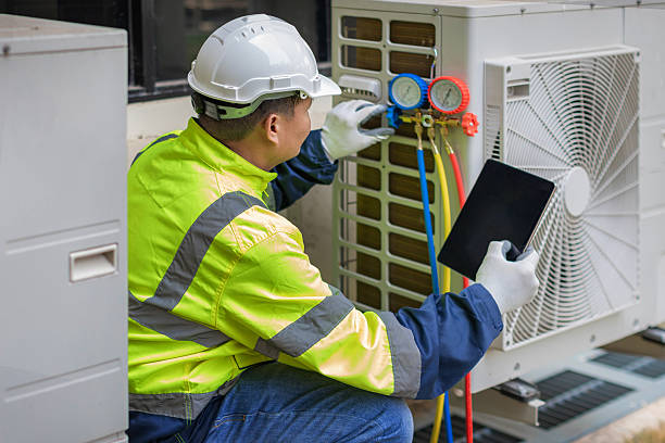 Professional Air Conditioning Repair technician working in Dunlap, IL